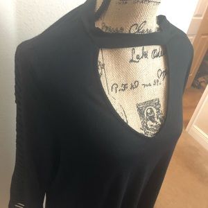 Black blouse with holes in sleeves